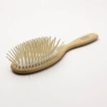 The brush has long pegs that are suitable for all hair types.