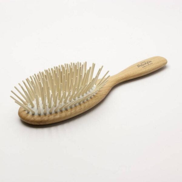 The brush has long pegs that are suitable for all hair types.
