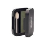 The olive green eyeshadow with silver mother-of-pearl evenly covers the eyelid and