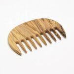 Afro Comb is an olive wood comb made of olive wood soaked in oil.