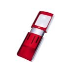 Retractable, illuminated magnifier with LED in red.