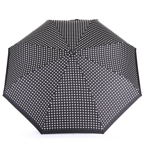 The automatic folding female umbrella Pierre Cardin 82258 is black and white. Automatic system of opening and closing umbrellas.