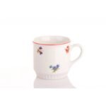 Practical Leo porcelain mug with a volume of 300 ml decorated with a handball with a red stripe.