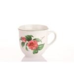 Porcelain mug with a pleasant shape decorated with a camellia motif.